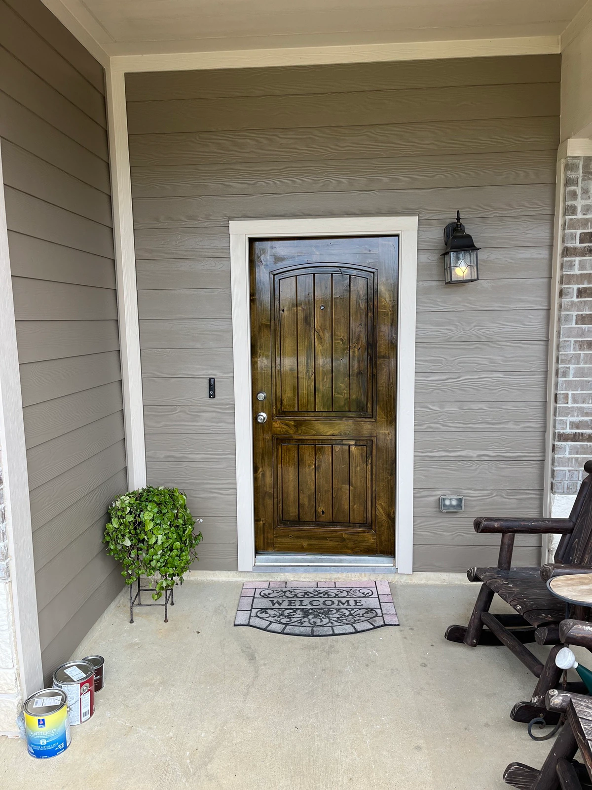 Covered Entry Repaint project photo in Tomball, TX