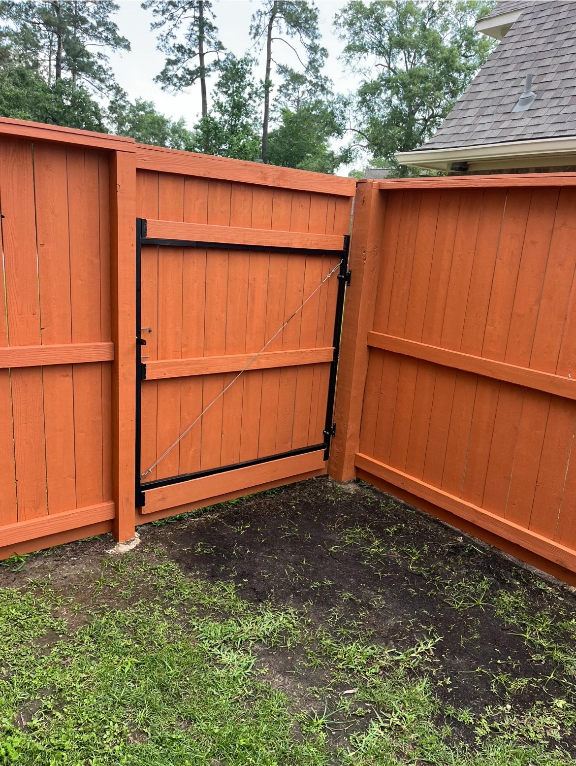 Fence Stain Refresh project photo in Spring, TX