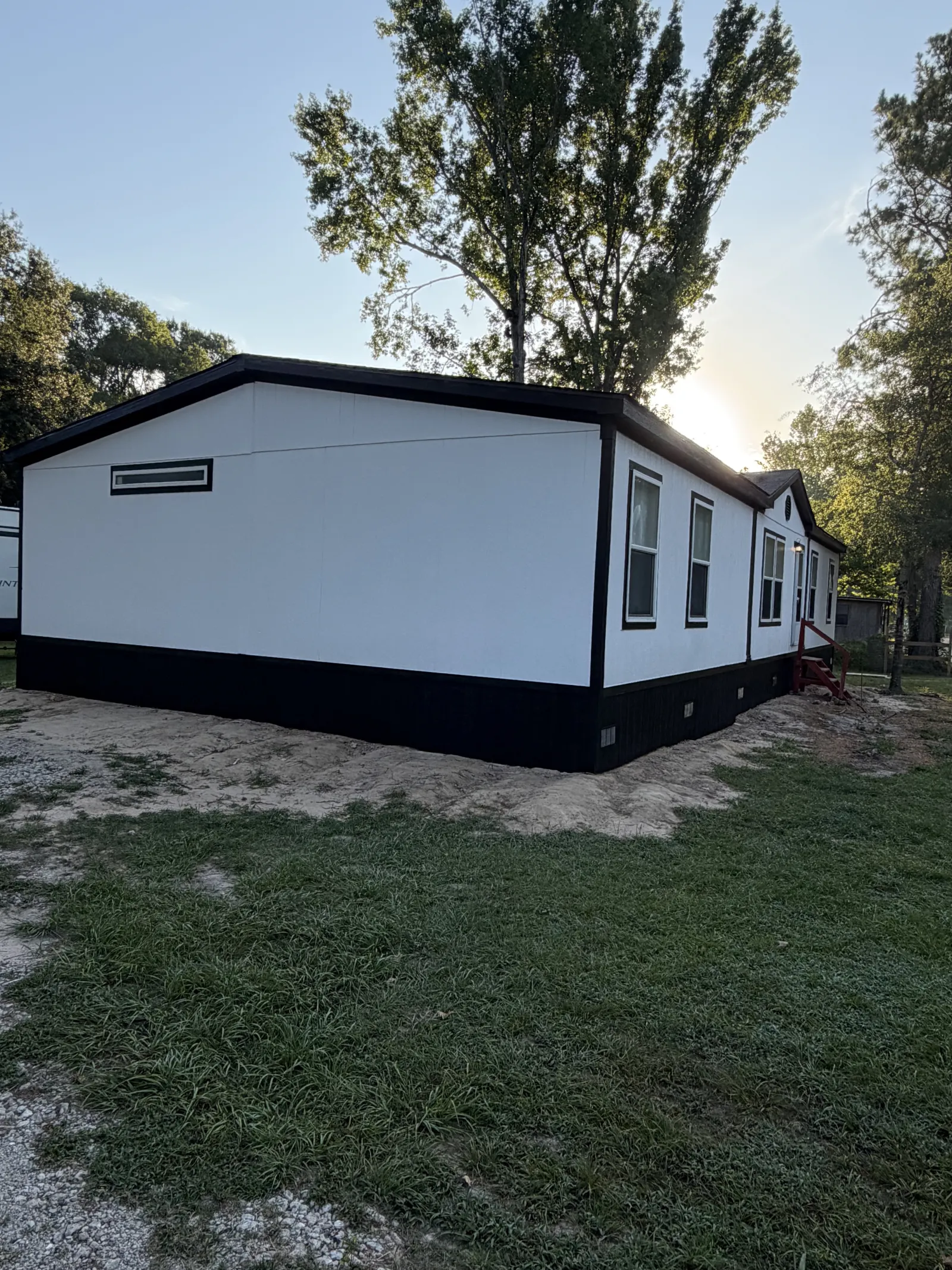 White Exterior Siding with Black Trim project photo in Houston Area